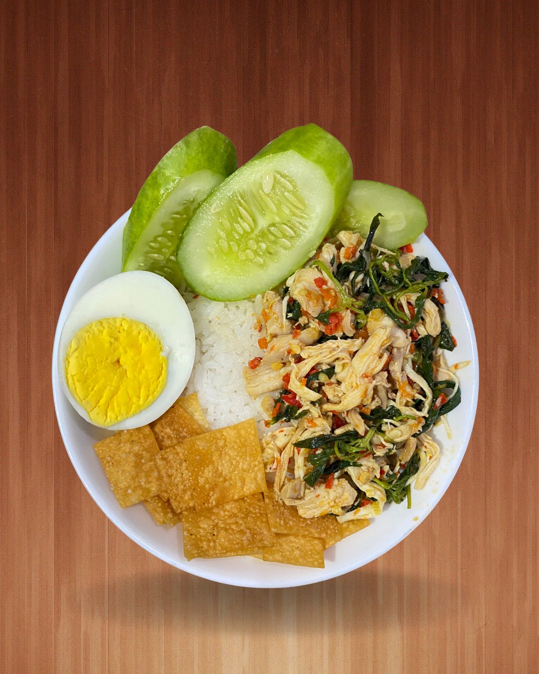 Ayam Geprek with rice and vegetables