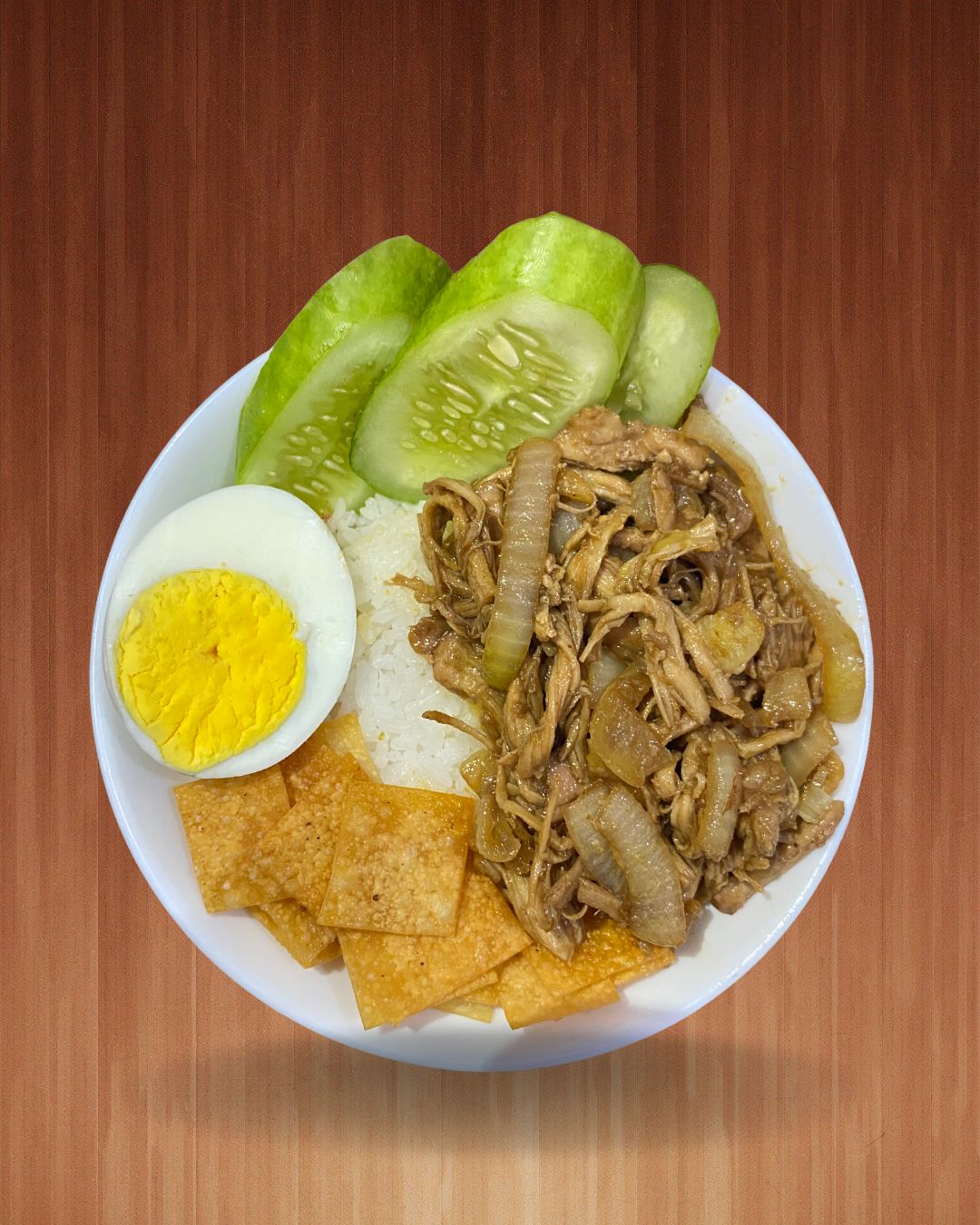 Ayam Geprek with rice and vegetables