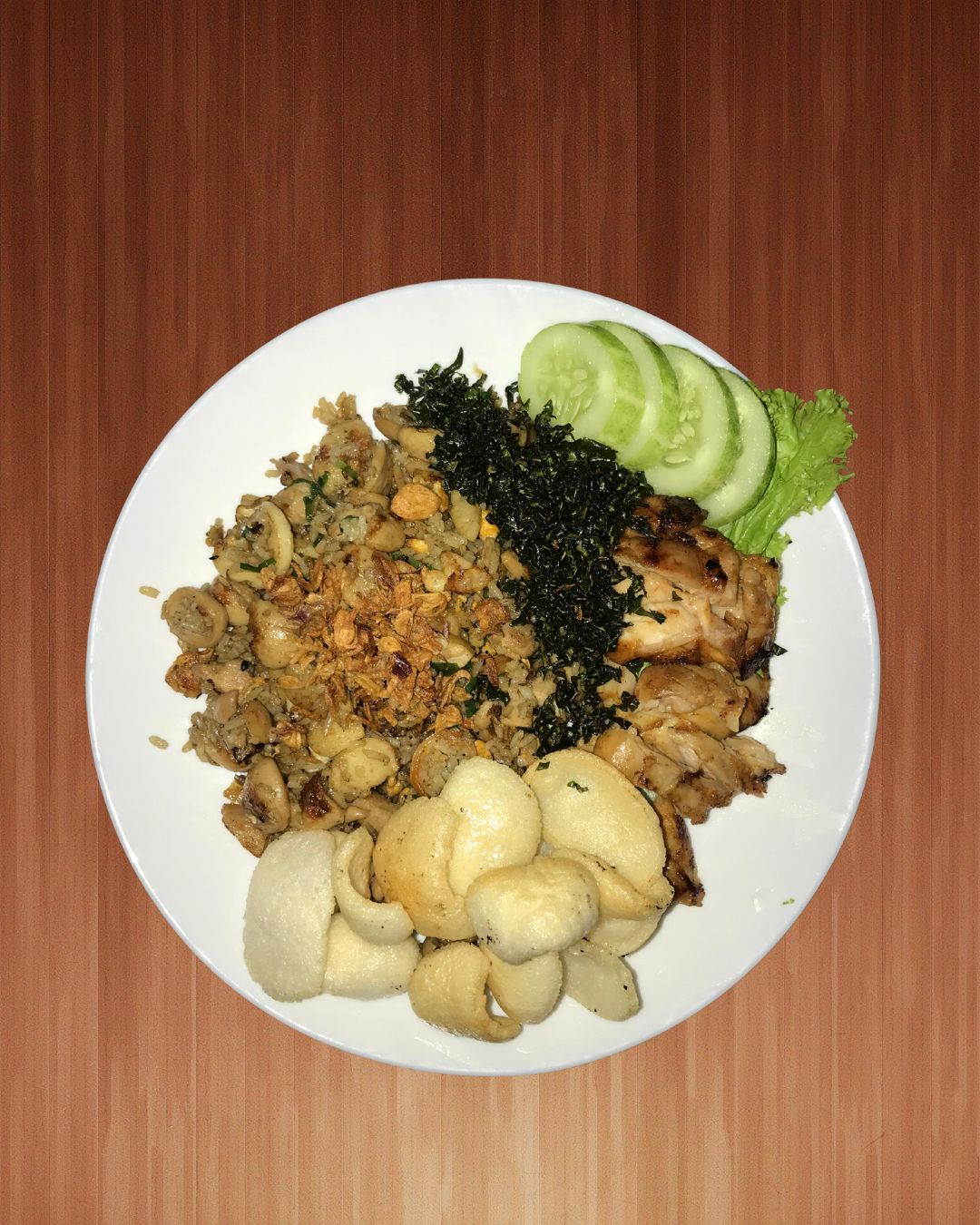 Ayam Geprek with rice and vegetables